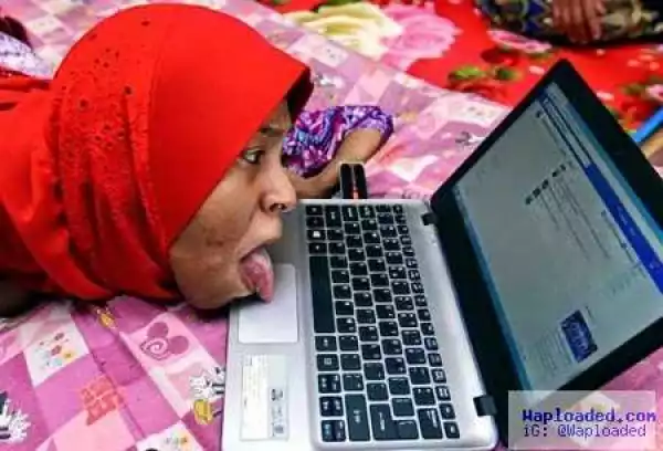 Amazing! Meet the Physically Challenged Girl who Operates Computer and Phone with Her Tongue (Photos)